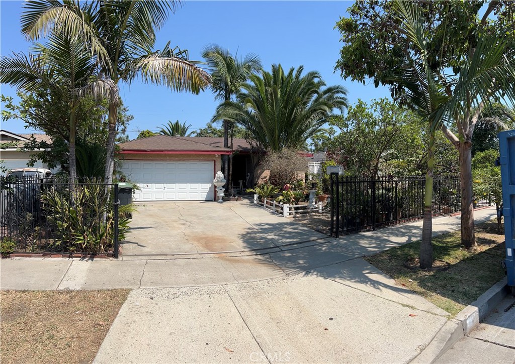 Welcome to this charming single story 3 bedroom 2 bath home in the heart of Santa Ana. This loving home sits on a spacious 6400+ sq ft lot with lush front and backyard full of decorative green plants and palm trees, the spacious covered patio offers access to a large backyard with enough space to build a pool or great for entertaining. The home offers newly remodeled kitchen cabinets with recess lighting installed in the living room and with luxury vinyl tile throughout the bedrooms. The dinning room leads to the cozy den that has a room set up for a small office or workout room, and a second separate full bathroom. These upgrades make it ideal as a starter home or for investors looking to add an ADU. Conveniently located in a well established family neighborhood with easy access to freeways, restaurants, shopping, and entertainment such as Main Place Mall, plus explore nearby cultural gems like the Bowers Museum, and the Discovery Cube. This home is SOLD AS IS and seller will offer buyers home warranty. You will love this home!
Note:The property has 3 bedrooms 2 bath, the second bathroom is unknown if permitted or not as well as the den and additional office/workout room next to the den, buyer to do its own investigation.