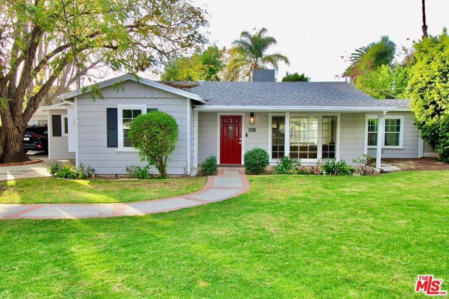 Beautiful gated cul-de-sac pool home on over a quarter acre! This updated 3BR/3BA residence features decorator touches throughout plus separate guest quarters. The chef's kitchen offers quartz countertops, stainless-steel appliances, a built-in microwave/hood, refrigerator, and custom cabinetry with pull-out drawers. The home includes two primary suites with direct access to the backyard and pool; one offers a walk-in closet, and both have private bathroomsincluding one with a jetted tub, custom tile accents, and a modern LED mirror. Energy-efficient upgrades include dual-pane windows (select), LED lighting, low-flow fixtures, and a smart Wi-Fi thermostat, along with two separate HVAC systems for the main home and the converted garage. The fully finished converted garage can serve as a home office, gym, studio, or guest quarters and includes its own washer and dryer. The expansive, low-maintenance backyard features grassy play areas, a sparkling swimmer's pool, and a storage shed, with a private carport for parking. With easy access to the 101, 405, and 118 freeways, you are centrally located while still enjoying neighborhood peace and quietjust minutes from Northridge Mall, Porto's, In-N-Out, and more.Stay safe,