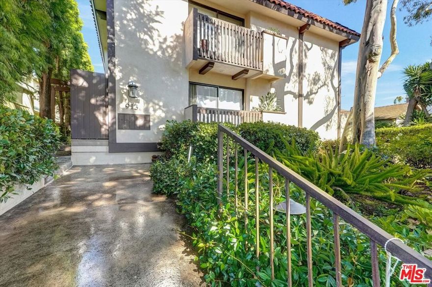 Step into this inviting, freshly painted townhome featuring a classic layout with modern touches. The main level offers gleaming hardwood floors, a bright open living area with cozy fireplace, and two semi-private patios perfect for relaxing or entertaining. The spacious dining area flows seamlessly outdoors to a larger patio, ideal for alfresco dining. Upstairs, you'll find two generous bedrooms, each with its own en-suite bath. The primary suite includes a cozy fireplace, walk-in closet, semi-private balcony, and an additional closet for extra storage. Additional highlights include BRAND NEW double pane windows throughout, carpet upstairs, recessed lighting, plantation shutters, double linen closets, and a convenient first-floor powder room. Enjoy direct access to a private two-car side-by-side garage with washer and dryer. This small, intimate building, located just moments from Montana Avenue's vibrant shops and cafe's, combines comfort, style, and unbeatable convenience. A must see!