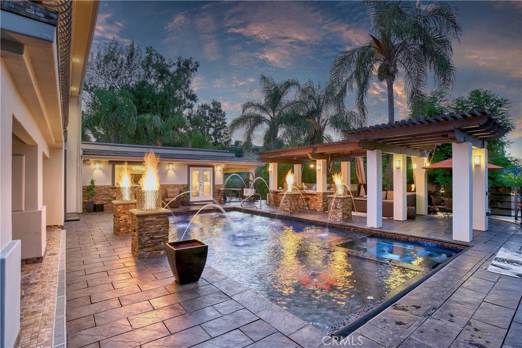 Photo of 4760 Corbin Avenue, Tarzana, CA 91356 (MLS # SR26048031)