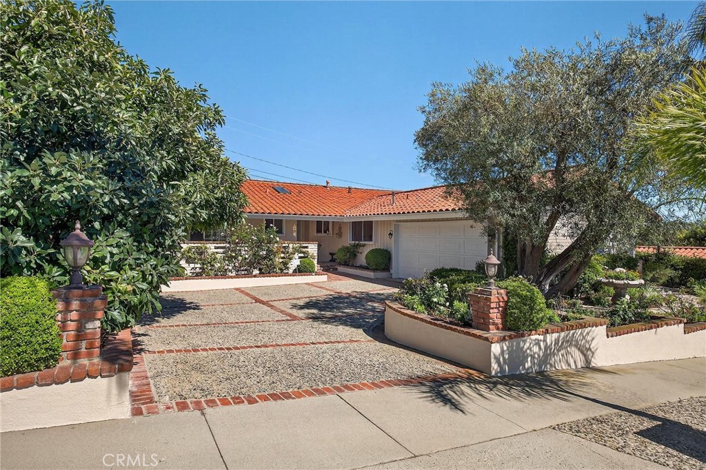 PRESENTING ~ 27032 Freeport Rd. This Stunning One-Level 5 bedroom 4 bath home features ENDLESS ALL-ENCOMPASSING OCEAN TO OCEAN VIEWS. The home features panoramic Queens Necklace, White Water, City Lights, So-Fi Stadium, Hollywood Sign, Downtown LA, Mountain and all the way to Long Beach views !!! This gorgeous home is located on a quiet family friendly street. The home offers much class and sophistication with a warm family home feel along with excellent overall design and flow. The entertaining open floorplan leads directly into the kitchen and family room. The home offers natural ambient light throughout. The living areas are adorned beautifully and adjusts to any lifestyle from the family/kids play-hang out area to the jet-setter entertainment space. The bedrooms are all ample in size. Take notice of the two en-suites. Both offer outdoor seating, the primary bedroom opens to the rear yard and of course the majestic views. The kitchen is conveniently stationed at the center of the home and offers a double oven, plenty of cabinet/storage space along with a newer Bosch dishwasher. Take notice of the newer ceiling fans, lighting, tankless water heater, primary bath remodel, drywall and insulation throughout, and a quiet garage door motor. Additional upgrades and features include newer interior paint and new landscaping, central vacuum system, attic space with pull-down access ladder, newer pavers, large capacity mailbox, the living room addition included 6 caissons, 8 mature fruit trees surround the property. The spacious rear yard offers plenty of room to entertain or simply enjoying a game of catch all while soaking in the spectacular views. Located within walking distance to Peninsula High School and Peninsula Center, this home offers an unbeatable blend of comfort, style and convenience. Whether you're entertaining guests or enjoying a quiet night in, this home is an absolute GEM and a must see !!!