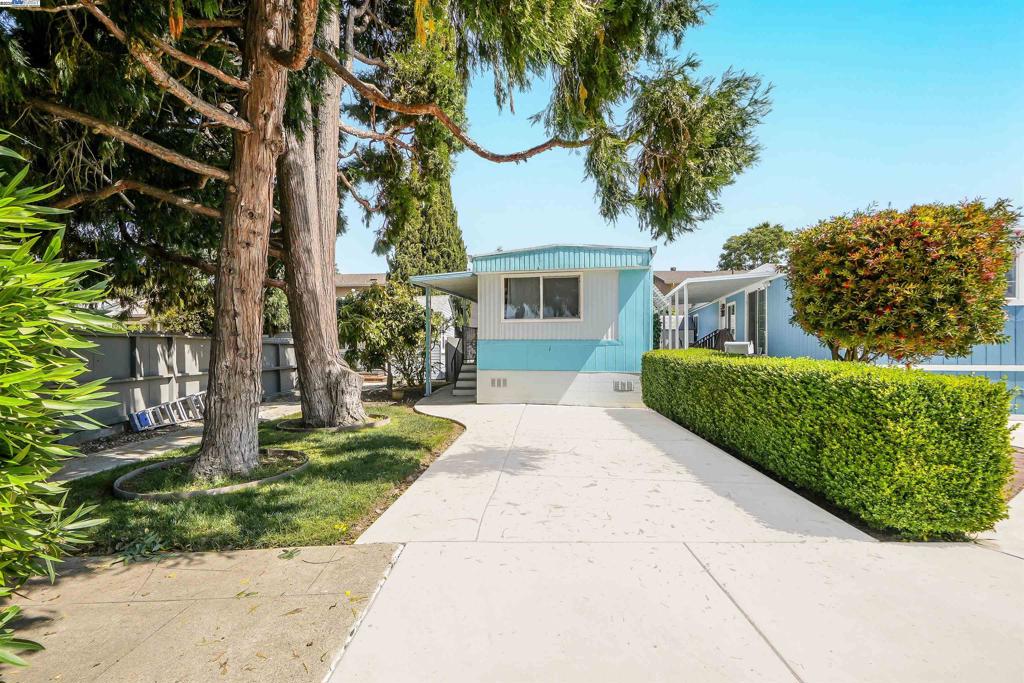 Step into this thoughtfully updated 1-bedroom, 1-bath home located in a quiet and welcoming all-ages community in Hayward, and space rent is only $750! With 480 sq. ft. of well-utilized living space, this inviting residence offers a perfect blend of comfort, modern finishes, and peaceful surroundings. This home features a beautiful front yard with a lush lawn and mature trees that provide refreshing shade in the warmer months. A private backyard offers a great space for relaxing or gardening. Inside, you’ll find tasteful updates throughout, including textured and insulated walls, durable laminate flooring, granite countertops, and soft-close cabinetry. The exterior is just as impressive, with durable cement board skirting and a top-tier earthquake bracing system that delivers both stability and peace of mind. Enjoy added privacy with no neighbor on one side and peaceful views of greenery from your front and side windows. A designated parking space is also included. Don’t miss this fantastic opportunity to own a beautiful home in a welcoming Hayward community! Fireplaces: NO