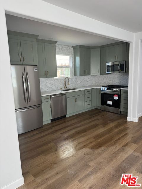 Photo of 1225 West Boulevard #1225 3/4, Los Angeles, CA 90019 (MLS # 26678837)