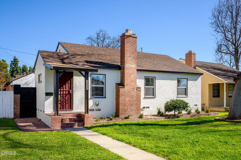 This stunning, light and bright home is located on a beautiful tree-lined street close to Palm Park and the Whittier Greenway Trail. Recently remodeled, the house has new laminate hardwood-like floors, new paint, new windows, central AC/Heat, and landscaping. The living room features a lovely fireplace (not to be used for fire - decoration only), large entry closet, and beautiful wainscoting in the dining area. The remodeled kitchen boasts new tile flooring, beautiful white stone counter tops, ample cabinetry and drawers, stainless steel Samsung dishwasher and Whirlpool 4-burner stove. The hallway boasts original built-in cabinets and drawers, plus additional cabinets and folding area for the laundry (side-by-side washer/dryer not included). Two of the bedrooms feature cedar lined closets with built-in shoe racks and mirrored sliding doors with one of the bedrooms having its own full bathroom with new vanity sink. The primary bedroom features a large window view to the back yard and plenty of built-in closets with overhead storage space. The newly landscaped, private back yard features fruit trees, space for out door seating, a lovely grass area, and additional driveway parking space next to the garage. There is also an additional, separate bonus room extending off the primary bedroom sealed off from the main house with its own separate entrance that would be perfect for a private office or workout room (bonus room is not to be used as a bedroom or living space).
