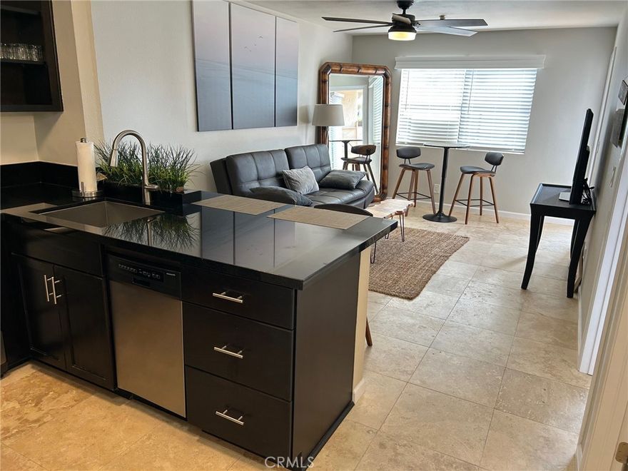 YOUR best life starts here!  AMAZING location!  This unit is located on the Quiet, West Beach-Side of the building on the 1st floor making it ideally situated for easy access!  Relax on your private patio and enjoy cool ocean breezes.  A BEACH Condo that's Elegant and Beach friendly.  This stunning Condo offers 1 bedroom, 1 bath and a lifestyle filled with relaxation.   The living area and bedroom are bright and light.  Chocolate-colored Maple self-closing cabinets with Granite counters in the kitchen and bath. Kitchen has stainless steel appliances and a farmhouse sink. Fun lighting over the breakfast bar.  Bath has a glass vessel sink and tub/shower surround w/beautiful detailed inlay.  Flooring throughout is 18" Travertine in a soft beige color. The Bedroom comes with a large walk-in closet with built-in storage.  Ceiling fans, upgraded interior doors, baseboards, lighting, faucets and fixtures add to the upgrades.  The Friendly Vista Oceana Community offers residents a smoke-free building with locked Lobby Security and GATED parking with your assigned 1-car CARPORT. Guest parking in the front open area, also! Enjoy the common area with outdoor cooking/BBQ.  Take a dip in the Spa/hot tub. Grab your board and bike because you are just minutes away from World-Renowned beaches and some of the best SURF spots in California! Trestles (Upper and Lower), Cottons, San Clemente State Beach, Riviera district, Lost Winds and more. The 2028 Los Angeles OLYMPICS SURFING Competition will be held at Trestles.  You'll be right there!  The closest Beach is only a leisurely 15 minute walk out your door. You also have the San Clemente Beach Trail and Calafia Beach right in your backyard.  You can walk along the beach to the San Clemente PIER. If golf is your thing-walk to the San Clemente Municipal Golf Course just across the bridge just East of the I-5.  HOA dues ($330 month) include WATER, HOT Water, Sewer & Trash-Owners ONLY pay for Electricity and Internet/Cable. With easy access to restaurants, entertainment and the freeway, plus the world's greatest CLIMATE! -- Where else can You get a great condo, price and low HOA to be this close to the SUN, SAND & SURF.....   Looking for that Friendly small condo complex where you can get to know your neighbors--this is it--there are only 48 units in "Vista Oceana".  A RARE find--in the "Vista Oceana" community on the OCEAN side of the 5 freeway in the most desirable SW San Clemente location.