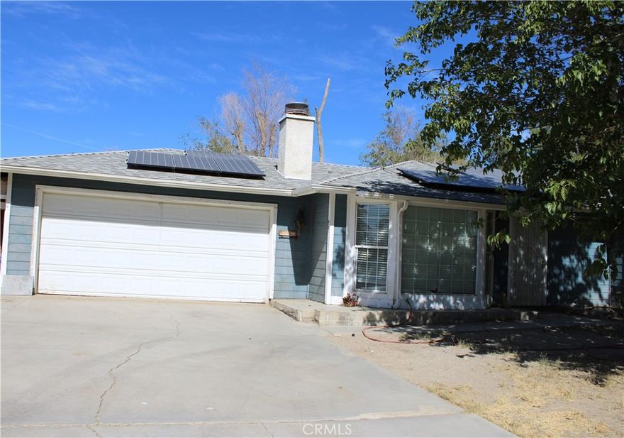 This house is situated on tree-lined paved street and has lots of potential. 3 bedrooms, 2 bath and a single story home so bring your toys and imagination to make it your own. Room for horses, livestock, and RV! The house has paid in full solar panel system and newer air conditioning system! Enjoy the feel of the open country but in town!

Property has an outbuilding and storage shed for your tools, etc and the backyard affords beautiful nights and space to barbecue.