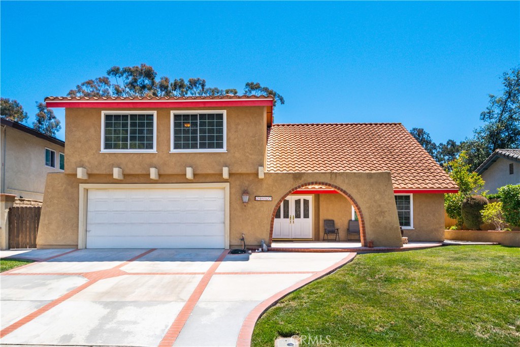 Stunning Mediterranean Home for Rent in Prime Location! Discover the perfect blend of elegance and comfort in this beautifully remodeled Mediterranean-style home, spanning 2,874 sq.ft. Nestled within a short walk to DePortola Elementary, LaPaz Intermediate, and Mission Viejo High, this home is ideal for families seeking convenience and style. Step into a grand living room adorned with vaulted ceilings and stately columns, offering a welcoming ambiance. The heart of the home boasts a gourmet kitchen featuring custom cabinets, granite countertops, stainless steel appliances, double ovens, and a spacious walk-in pantry. Enjoy cozy family gatherings by the fireplace or host friends in the bright upstairs bonus room—perfect for a media room or a potential 5th bedroom. Retreat to a sumptuous master suite with a luxurious bathroom, dual sinks, custom cabinetry, and a stunning standalone shower. The additional bedrooms are equally spacious, complemented by a stylish guest bathroom. Outside, relish a serene backyard oasis with no rear neighbors, complete with a patio area and lush grass—ideal for outdoor entertaining or relaxing in privacy. The expansive two-car garage offers ample storage with a built-in workbench and laundry space. Located just a mile from the freeway and steps from the city's vibrant center—including libraries, shops, and restaurants—this home truly has it all. Plus, pets are welcome! Don’t miss the opportunity to make this enchanting Mediterranean retreat your new home. Schedule a viewing today!