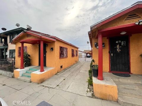 Photo of 4271 S Kansas Ave, Los Angeles, CA 90037 (MLS # DW25224201)