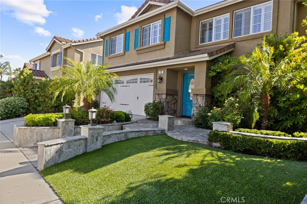 Located on a quiet cul-de-sac with no HOA, this beautifully upgraded, turnkey home offers 4 bedrooms and 2.5 bathrooms. The spacious primary and secondary bedrooms feature custom walk-in closets. The upstairs guest bathroom includes dual vanities and custom tile work, while the primary suite offers additional upgrades such as dual vanities, a jetted soaking tub, and a walk-in shower with dual shower heads.
Interior features include wood shutters, crown molding throughout, and Travertine flooring in the downstairs living areas. The kitchen is equipped with double ovens, a touch-activated faucet, and ample workspace.
Recent updates include new dual-zone HVAC systems with separate upstairs/downstairs controls, additional attic insulation, and a radiant barrier for energy efficiency. The home has been freshly painted upstairs and down, and features an updated built-in entertainment center with new stain, as well as a custom-built bar with hutch lighting and storage.
A new XL picture window and matching sliding glass doors in the second living room enhance the indoor/outdoor living, complete with custom electronic blinds. In the backyard to enjoy a custom pergola with fan and lighting, Pebble Tec pool and spa with Wi-Fi controls, a built-in BBQ, and a gas firepit—all surrounded by lush landscaping.
Additional highlights include low-maintenance front yard turf and a finished garage with epoxy flooring.