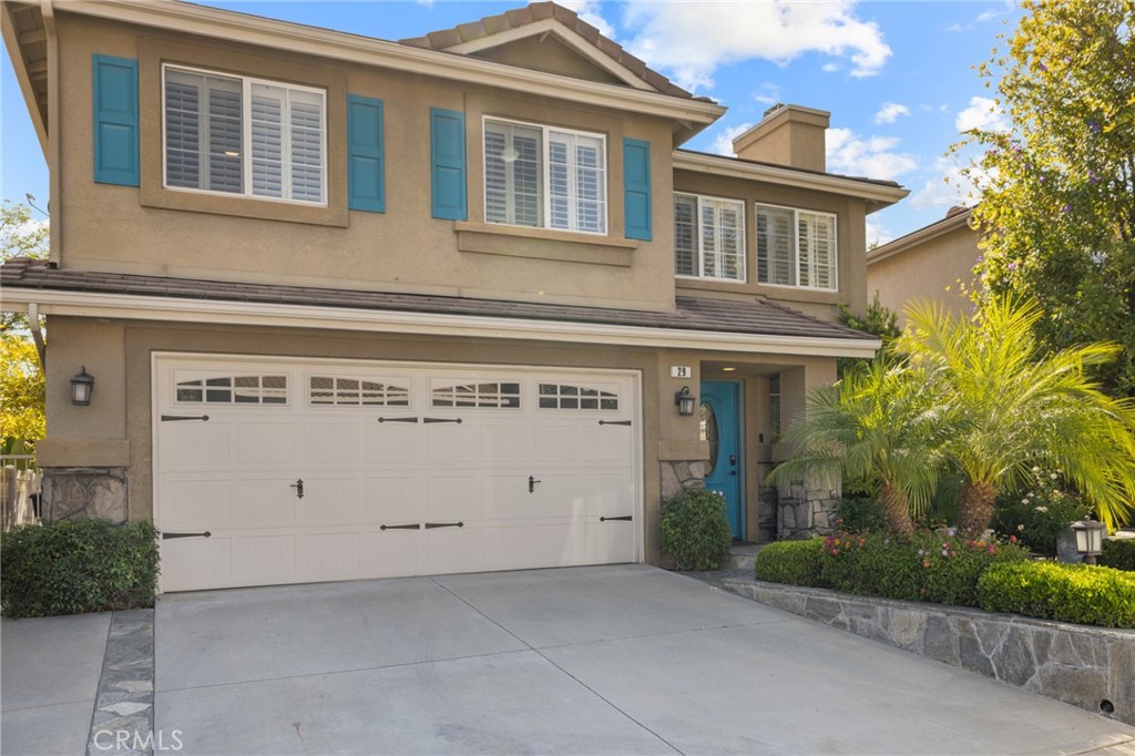 Located on a quiet cul-de-sac with no HOA, this beautifully upgraded, turnkey home offers 4 bedrooms and 2.5 bathrooms. The spacious primary and secondary bedrooms feature custom walk-in closets. The upstairs guest bathroom includes dual vanities and custom tile work, while the primary suite offers additional upgrades such as dual vanities, a jetted soaking tub, and a walk-in shower with dual shower heads.
Interior features include wood shutters, crown molding throughout, and Travertine flooring in the downstairs living areas. The kitchen is equipped with double ovens, a touch-activated faucet, and ample workspace.
Recent updates include new dual-zone HVAC systems with separate upstairs/downstairs controls, additional attic insulation, and a radiant barrier for energy efficiency. The home has been freshly painted upstairs and down, and features an updated built-in entertainment center with new stain, as well as a custom-built bar with hutch lighting and storage.
A new XL picture window and matching sliding glass doors in the second living room enhance the indoor/outdoor living, complete with custom electronic blinds. In the backyard to enjoy a custom pergola with fan and lighting, Pebble Tec pool and spa with Wi-Fi controls, a built-in BBQ, and a gas firepit—all surrounded by lush landscaping.
Additional highlights include low-maintenance front yard turf and a finished garage with epoxy flooring.