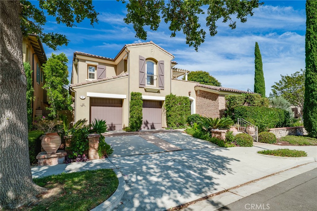 Executive Luxury Tuscany-Inspired Model Home
This Tuscany-inspired masterpiece sits on a coveted corner lot in the prestigious Woodbury community at Juliet’s Balcony Estate. Offering 5 bedrooms and 4.5 bathrooms, the home includes a versatile loft that serves as the fifth bedroom.
An open-concept floor plan highlights soaring vaulted ceilings, an elegant formal dining room, and a living room with a cozy fireplace. The gourmet chef’s kitchen is equipped with Viking appliances, custom cabinetry, crown molding throughout, wood floors on the main level, and an integrated surround-sound system. A leased, transferable Sunrun solar system helps keep utility costs low.
The expansive primary suite is a true retreat, featuring a private balcony, a fireplace, and a spa-like bathroom. Two additional bedroom includes its own ensuite bath for privacy and convenience. Additional highlights include:
A private casita, ideal for guests or extended family
A dedicated movie room and computer workstation
A spacious three-car tandem garage with epoxy floors
Residents enjoy Woodbury’s world-class amenities, including resort-style pools, pickleball and tennis courts, soccer fields, outdoor barbecues, and access to the renowned Jeffrey Open Space Trail—all within an award-winning school district.
This is more than a home—it’s a lifestyle defined by comfort, luxury, and distinction.