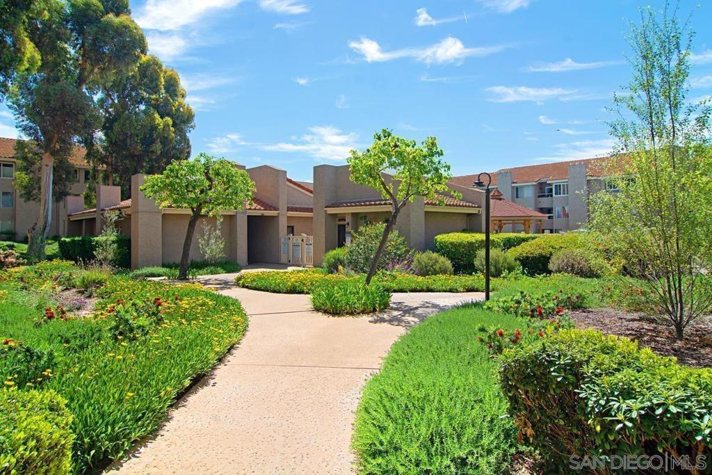 Welcome to this beautifully maintained corner unit in the heart of Mission Valley, offering comfort, privacy, and resort-style living. Being a corner unit, you share only one wall with neighbors, creating a more peaceful environment. The spacious interior features hardwood flooring in the living room and kitchen, a smartly designed floor plan, and upgraded energy-efficient dual-pane windows, A newer AC system, a significant upgrade that typically requires a crane to replace.Two private balconies overlook abundant greenery offering serene spots to enjoy your morning coffee or evening unwind. This first-floor unit has convenient elevator access and is move-in ready. Laundry facilities are nearby, with hookups available should you prefer your own in-unit system. The home includes two parking spaces one covered and one uncovered adding to its everyday convenience. Community amenities are extensive: a sparkling pool, relaxing sauna, fitness center, tennis courts, dog park area, racquetball courts, and lush landscaped grounds.The location offers unbeatable convenience: just minutes from shopping, dining, Snapdragon Stadium, & SDSU