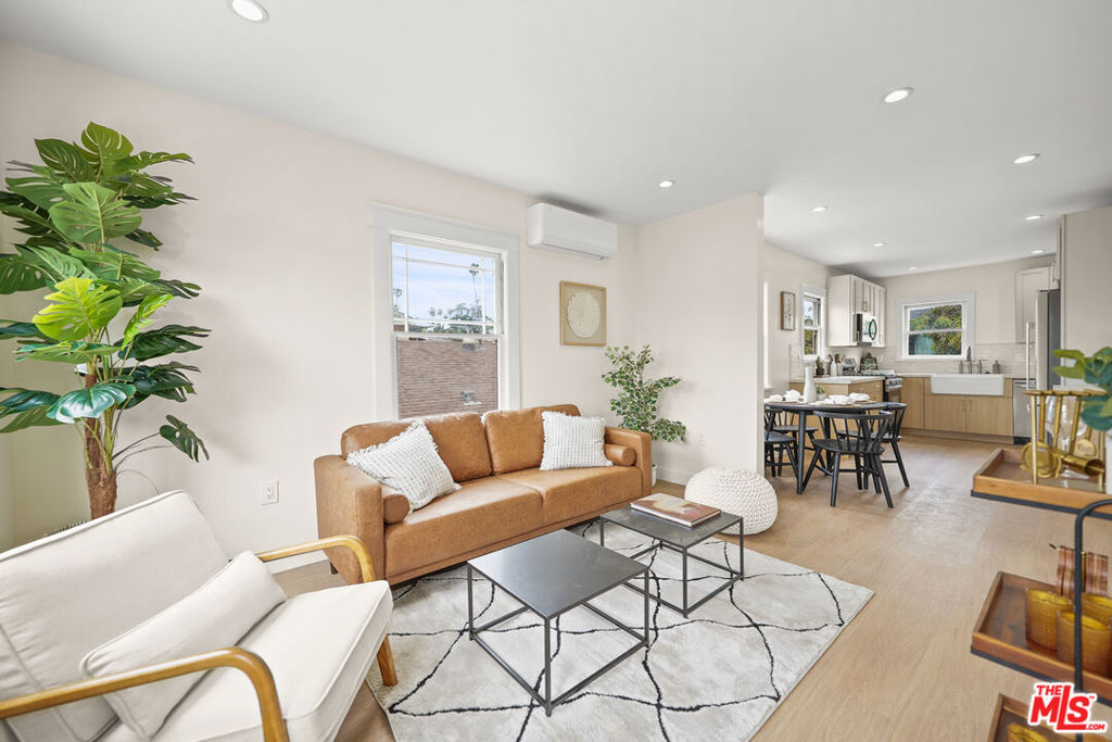 Step into the hottest slice of Highland Park. A dreamy, fully remodeled and detached (no shared walls) 2-bedroom, 1-bathroom single-level unit within a stylish Tenants in Common community. This charming residence beautifully blends vintage charisma with chic, modern updates. Everything here is new: sparkling recessed lighting, sleek plumbing, HVAC mini split systems, a designer-inspired kitchen, and stunning bathrooms adorned with contemporary finishes. The gourmet kitchen includes stylish cabinetry, premium appliances, and abundant natural light, flowing effortlessly into the dining space and cozy living room. But the location steals the show, right off buzzing Figueroa Street, your future home is steps away from Highland Park's most beloved hotspots. Stroll over to Tierra Mia, Civil Coffee or Kindness & Mischief for your daily brew, indulge in artisanal pastries at Mr. Holmes Bakehouse, or unwind at popular nightlife haunts like Highland Park Bowl and Block Party. Explore creative eats at Kitchen Mouse, Triple Beam Pizza, or Hippo, and enjoy vintage shopping sprees at The Bearded Beagle or Avalon Vintage. A front yard & covered porch enhance this space and provide an excellent space for gardening, entertaining, or just sitting out on those warm evenings. This isn't just a home; it's your ticket to the vibrant lifestyle you've been craving, in the heart of Highland Park's famed cultural and culinary renaissance. Welcome home!