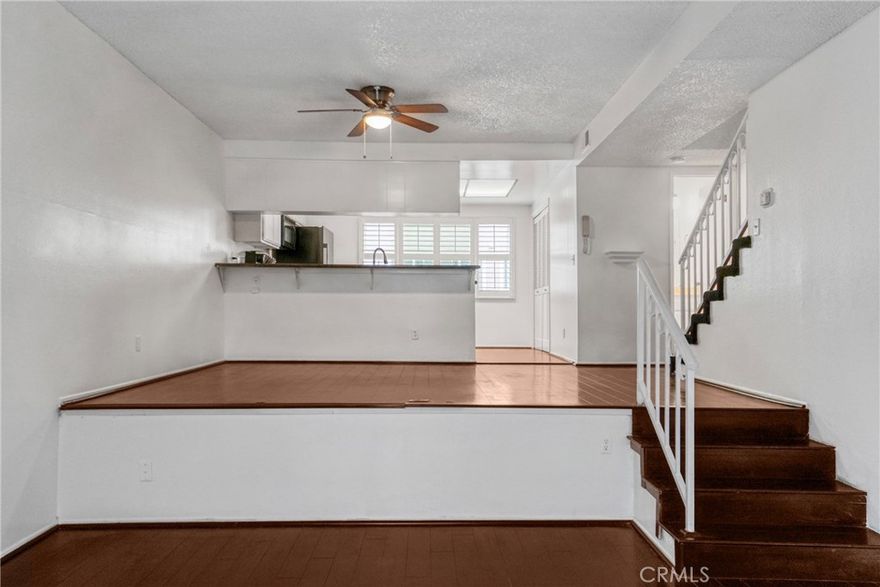 Welcome to 21602 Figueroa #10 — a beautiful 2-bedroom, 2.5-bath condo in the desirable Carson Courtyards community. Step through your private, gated entry into a cozy front patio — perfect for sipping your morning coffee, grilling on the weekends, or simply unwinding after a long day. Inside, the open-concept layout seamlessly connects the living room, dining area, and kitchen, creating an inviting space that works equally well for entertaining and quiet nights at home. A convenient half bath on the main level adds to the functionality. Upstairs, the spacious primary suite provides a relaxing retreat complete with a soaking tub/shower. Down the hall, the second bedroom is bright and roomy with generous closet space, set next to a full bath — an ideal setup for family, guests, or a home office. Living in Carson Courtyards means more than just a home — it’s a lifestyle. Residents enjoy access to a sparkling pool, rejuvenating jacuzzi, and a welcoming clubhouse, perfect for soaking up the sunshine and connecting with neighbors. The location couldn’t be more convenient: just minutes to schools, shopping and dining at South Bay Pavilion Mall, Dignity Health Sports Park, and Harbor-UCLA Medical Center. Commuting is a breeze with quick access to the 405, 110, and 91 freeways, while Redondo Beach is only a short drive away. If you’re looking for a home that offers comfort, convenience, and a true sense of community, 21602 Figueroa #10 is waiting for you.