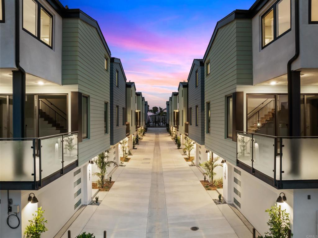 Brand-NEW Beach Townhome Just 1 Block from the Ocean, Move-in Ready Now! *Builder is offering a generous rate buydown incentive. Special financing options available to qualified buyers.* Welcome to 3582 Garfield Street, an exceptional end unit, three-story townhome located in one of Carlsbad’s premier beachside neighborhoods—just steps from the sand and a short stroll to Carlsbad Village. This newly built Twelve West residence offers 2,156 sq. ft. of thoughtfully designed living space, featuring 3 bedrooms, a bonus room/home office on the first floor, and 2 full + 2 half bathrooms. Enjoy the seamless flow of indoor-outdoor coastal living with a large deck off the great room and a private, fenced backyard. Crafted for modern coastal living, this home showcases European oak wood flooring throughout, owned solar panels, smart home features, and a direct-access 2-car garage with an epoxy-coated floor. The chef’s kitchen is a standout, equipped with premium Wolf and SubZero appliances, including a 36” dual fuel, 6-burner gas range, microwave drawer, built-in SubZero refrigerator, and separate wine fridge. Timeless quartz countertops, a waterfall-edge island, soft-close shaker cabinetry in white and stained wood, designer tile, brass hardware, and premium matte black Kohler fixtures elevate the space. The great room opens to a generous deck through stacking Western glass doors, plumbed for a BBQ and perfect for entertaining. Upstairs, the primary suite boasts vaulted ceilings, custom built-ins, a large walk-in closet, and a spa-inspired bathroom with a luxurious shower and upscale finishes. Two additional bedrooms and a laundry complete the third floor. The sun-drenched south-facing yard offers a blank canvas for your personal touch. Additional highlights include pre-wired speaker locations, pre-wiring for future Ring doorbell and security cameras + abundant storage throughout. Twelve West is a boutique coastal community just a block from the beach and moments from downtown Carlsbad Village, offering easy access to shops, dining, parks, and walking trails. Each home is designed to capture the essence of contemporary beachside living with light-filled interiors, private yards, breezy decks, and elegantly curated finishes by an award-winning design team. Don’t miss your chance to own a slice of paradise and live the ultimate Southern California coastal lifestyle at Twelve West.
