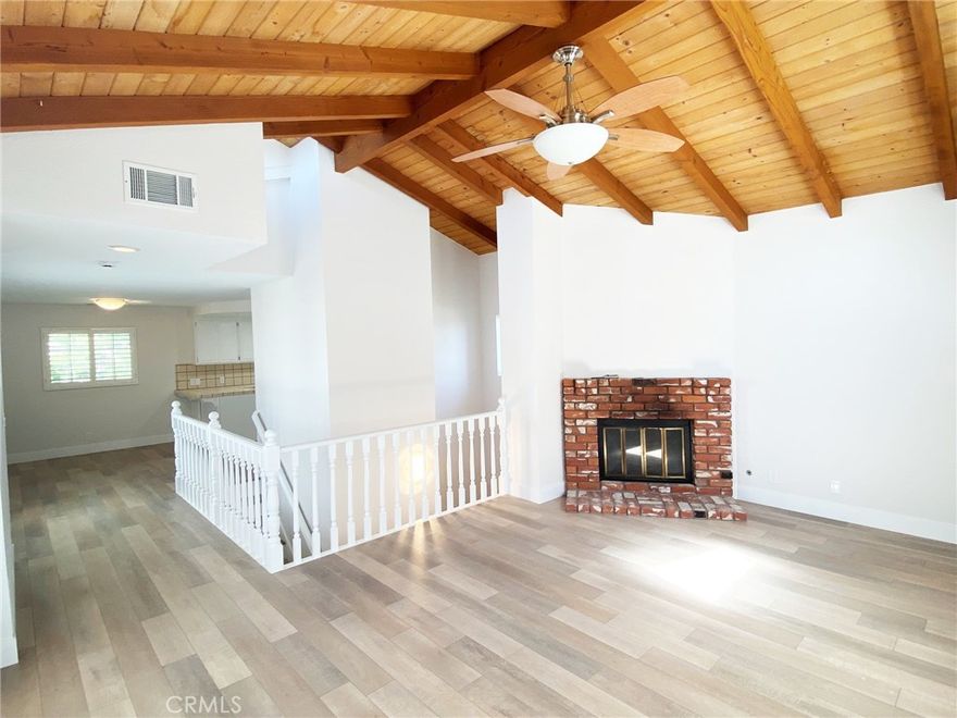 Discover the perfect blend of comfort and luxury in this beautifully remodeled two-story condominium located near the ocean. This charming home features 2 spacious bedrooms and 2.5 baths.  Enjoy tongue and groove vaulted wood ceilings with open wood beams that add character and elegance, new luxury vinyl flooring throughout the living spaces, freshly painted interiors for a clean and inviting atmosphere, a relaxing hot tub on the upper deck for ultimate relaxation and a convenient two-car attached garage for secure parking and storage.  Freshly installed toilets and bath hardware throughout. The kitchen features a new range/oven, vent hood and dishwasher, stainless refrigerator included. Do you like to warm yourself by the fire and enjoy the evening?  This property boasts a fireplace in the living room as well as one in the primary bedroom.  Both bedrooms possess en-suite bathrooms.  The exterior of this condo, in a duplex style set-up, has been freshly painted as well. You share no living space walls with the neighbor, only the garages share a wall. No HOA dues (but neighbor is open to setting one up if you’d like).  Don't miss the opportunity to own this exquisite condominium in a prime location, just minutes from Manhattan, Hermosa and Redondo Beaches. Enjoy the coastal lifestyle with easy access to the beach and nearby amenities including Alondra Park and Golf Course.  Very near the South Bay Galleria and Torrance Promenade for all your shopping needs.