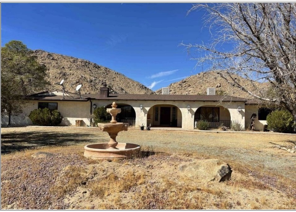 Ranch home on 5 acres located in a quiet cove setting, fully fenced and ready for horses.
This property offers a spacious kitchen with breakfast nook, ample counter and cabinet space, and a walk-in pantry. Living and dining areas include a sliding door to the back patio, perfect for entertaining. Additional family room for flexible living.
Primary suite with large closet. Attached three-car garage includes cabinet storage. Detached garage/workshop features office, bathroom, multiple roll-up doors, and 220 hook-up. Property also includes RV pad with full hookups, water storage tanks, and updated well and pump systems.