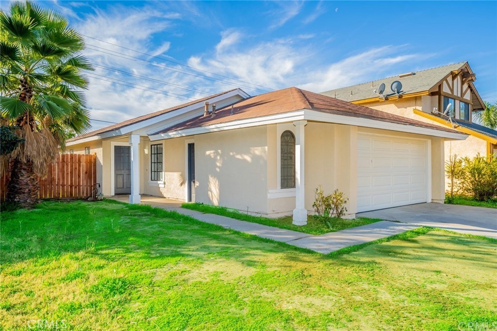 Fully renovated and move-in ready 3 bed, 2 bath home with an open layout, tall ceilings, and plenty of natural light. Interior upgrades include laminate flooring throughout, quartz countertops, modern stone finishes, and updated kitchen and bathrooms. Enjoy central air and heat, energy-efficient windows, and smart home camera features for added comfort and security.
The spacious, fully fenced backyard includes a storage shed, pomegranate and citrus trees, a privacy fence, and patio access from the kitchen—ideal for relaxing or entertaining. The side yard offers potential for a pool.
Located near shopping centers, major freeways, parks, schools, Kaiser Hospital, March Air Force Base, and Lake Perris with access to trails, campgrounds, and outdoor recreation.