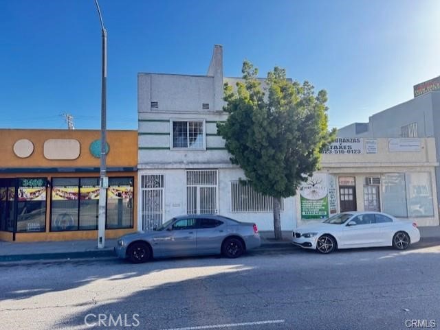 Great mixed-use commercial + residential building with retail/office space on the ground floor with excellent street exposure and excellent signage potential built into the façade of the structure Located on busy Beverly Blvd. and a great upstairs 2 bedroom / 2 bath apartment. Both units have two separate entrances at the front and rear of the two story building. Gated parking at the rear of the property for 4 cars. The 2nd floor is a very nice residential unit for the retail / office owner or occupant or it can be rented out separately to a tenant for extra income. Ground level was previously used as an office space, with a reception desk, a conference room and several sub-divided open workstations or cubicles. The lower office / retail unit also has 2 bathrooms and a full kitchen. Upper unit has a separate entrance from the street and enters into a spacious living room with large windows and a skylight, and has another entrance at the rear of the building also. The upper unit is nicely renovated and has 2 bedrooms and 2 baths with a kitchen and a dining area. The kitchen has been upgraded with granite countertops and newer appliances and the separate laundry room upstairs has a washer & dryer hook ups. The whole property is very secure with cameras, gated windows and doors, private parking for 4+ cars wrought iron automatic gate with an alley entrance. High traffic in a prime location zoned for general commercial welcoming retail, office, medical, food service, etc. Confirm with the City of Montebello. Seller is motivated. Bring offers and let's get this one in escrow..