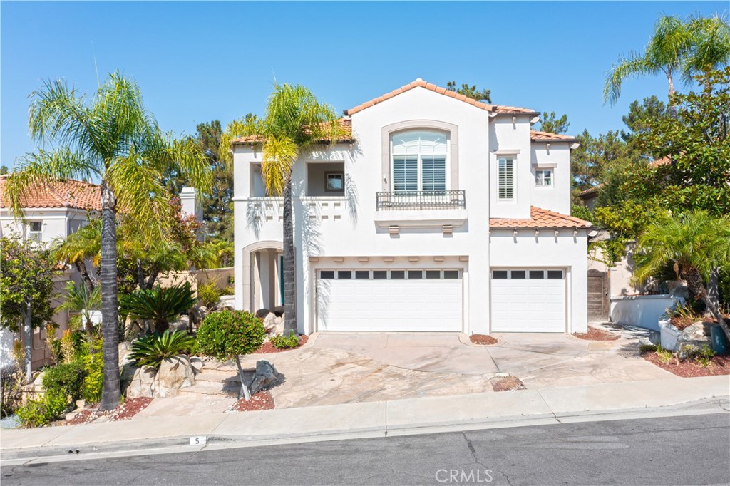 Welcome to 5 Encinal, a stunning residence located in the highly desirable Foothill Ranch community of Lake Forest. This spacious home offers 3,607 square feet of living space with five bedrooms and four and a half bathrooms, thoughtfully designed to combine comfort, elegance, and functionality. Built in 1994 on a 6,148 square foot lot, the property provides both indoor and outdoor spaces ideal for entertaining and everyday living.
As you enter, you are greeted by an inviting formal living and dining area that flows seamlessly into an open family room and kitchen. The kitchen features abundant counter and cabinet space, creating the perfect setting for family gatherings or entertaining guests. The family room extends to the backyard, where you will find a private outdoor retreat with ample space for barbecues, entertaining, or simply enjoying Southern California’s year-round sunshine. The floor plan includes a downstairs bedroom and full bath, making it ideal for multigenerational living, guests, or a home office. Upstairs, the expansive primary suite offers a spacious retreat with a spa-inspired bathroom and generous closet space. Four additional bedrooms and well-appointed bathrooms provide comfort and privacy for family and guests alike. This home is located within walking distance to award-winning schools, local parks, hiking and biking trails, and just minutes from shopping, dining, and easy freeway access. Offered at $2,199,900, 5 Encinal represents a rare opportunity to own a beautifully designed and generously sized home in one of Lake Forest’s most sought-after neighborhoods.