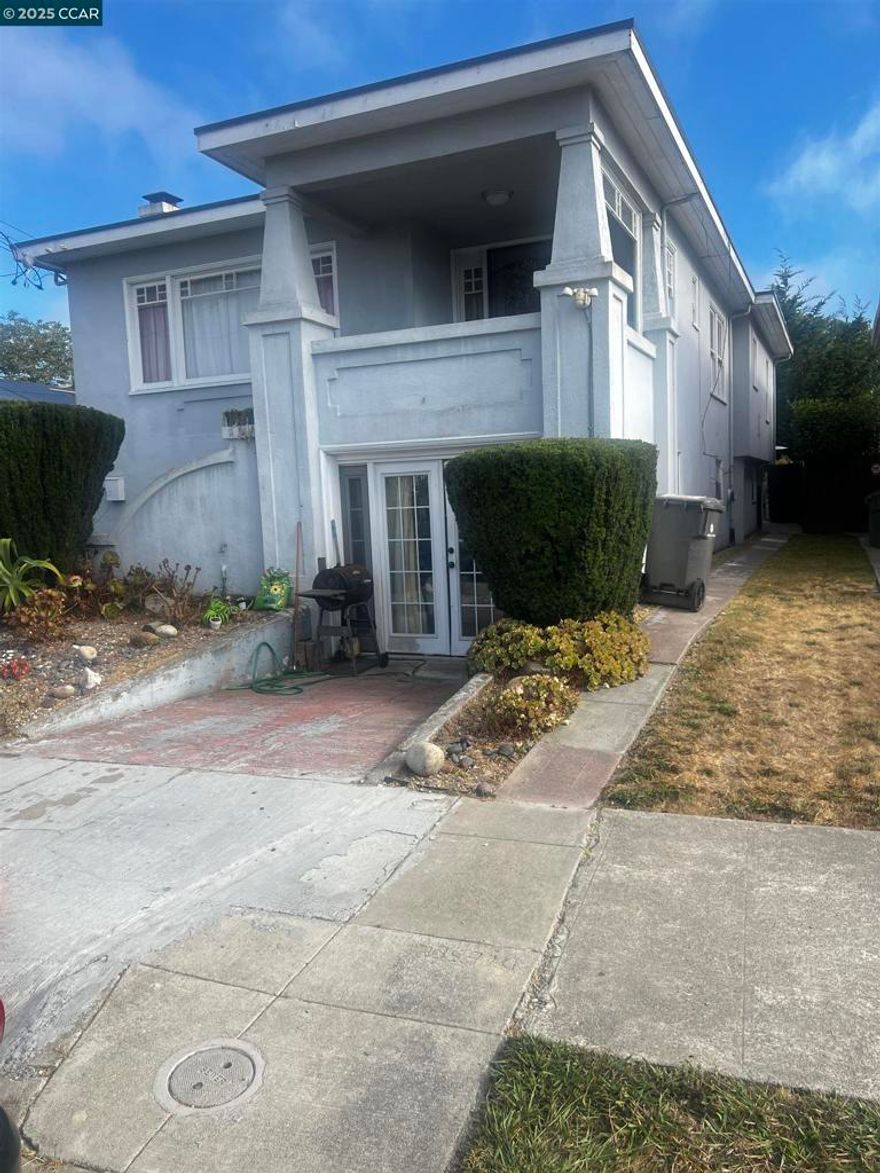Do not let the opportunity pass you by. This large home is located on the boarder of Berkeley in a much  desirable location. It features an attached Studio/1 bedroom unit for potential additional income.  The garage has also been converted to living quarters.