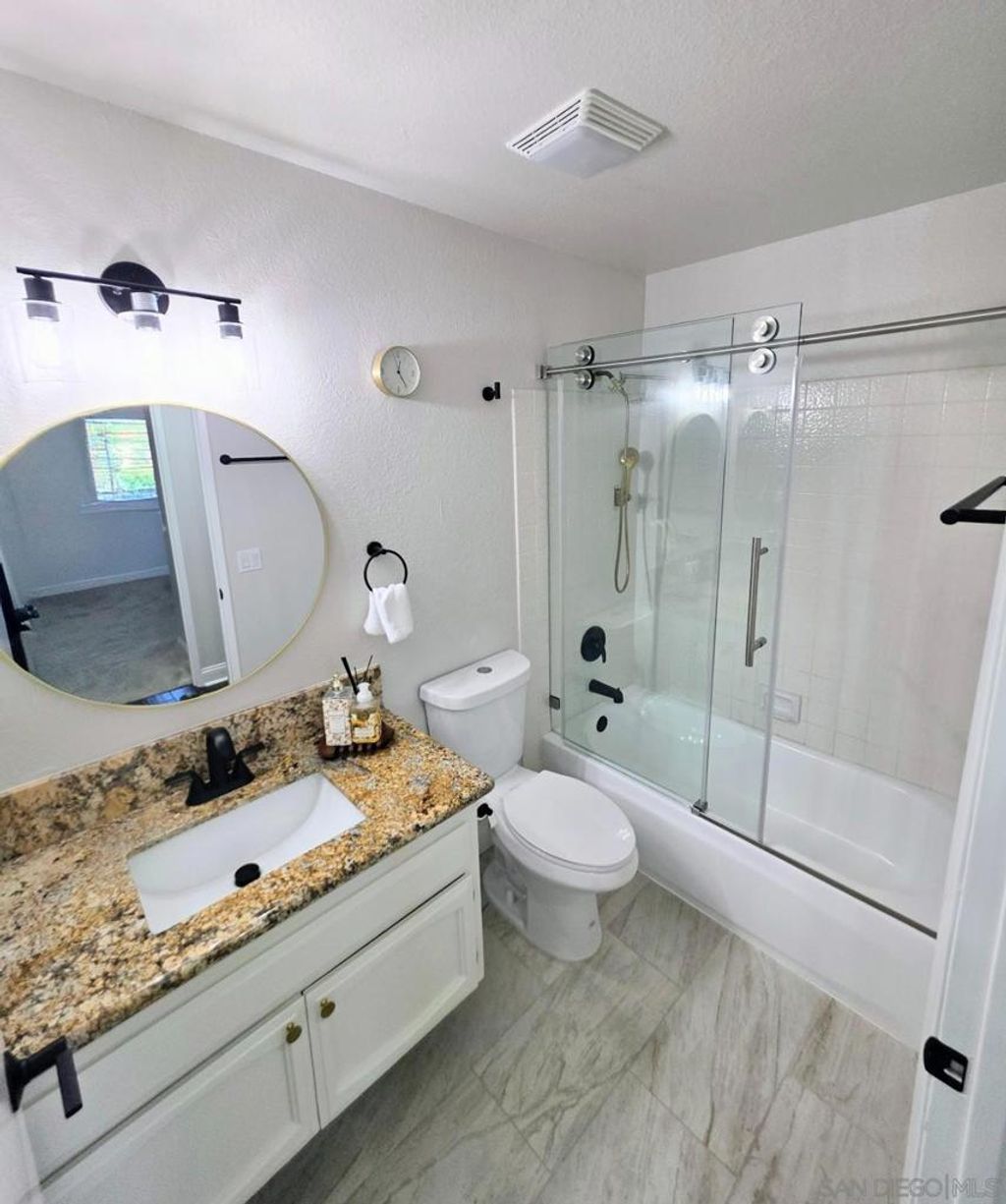 Photo of 11872 Bernardo Ter Ter #E, San Diego, CA 92128 (MLS # 260001624SD)