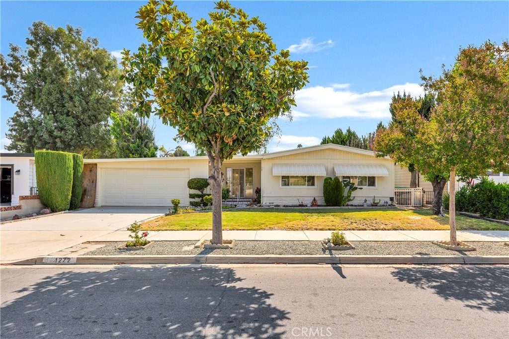Welcome to 1272 Brentwood Way, located in the well-established Seven Hills community of Hemet. This spacious manufactured home offers 2 bedrooms, 2 bathrooms, and approximately 1,670 sq. ft. of living space on a generous 7,841 sq. ft. lot. Built in 1976, the home provides plenty of charm and potential, along with the space and layout today’s buyers are looking for. As you enter, you’ll find a bright and open floorplan that makes the most of its square footage. The living and dining areas flow seamlessly together, offering an inviting setting for both everyday living and entertaining. The kitchen provides ample cabinet space and a functional design, ready for either move-in use or your personal updates. The primary suite is privately situated and includes its own bathroom, while the additional bedrooms are nicely sized for guests, family, or even a home office. A separate laundry area adds everyday convenience. Outside, the large 7,800+ sq. ft. lot offers endless possibilities. Whether you envision a garden, patio, or outdoor entertaining space, there’s room to make it your own. The wide lot also provides additional flexibility for storage and outdoor projects. Nestled in Seven Hills, this home enjoys the benefits of a peaceful neighborhood while remaining close to shopping, dining, medical centers, and local golf. Whether you’re looking for an affordable full-time residence, a seasonal getaway, or an investment opportunity, this property offers a wonderful balance of value, space, and location. Don’t miss this chance to make 1272 Brentwood Way your next home and create the lifestyle you’ve been waiting for.