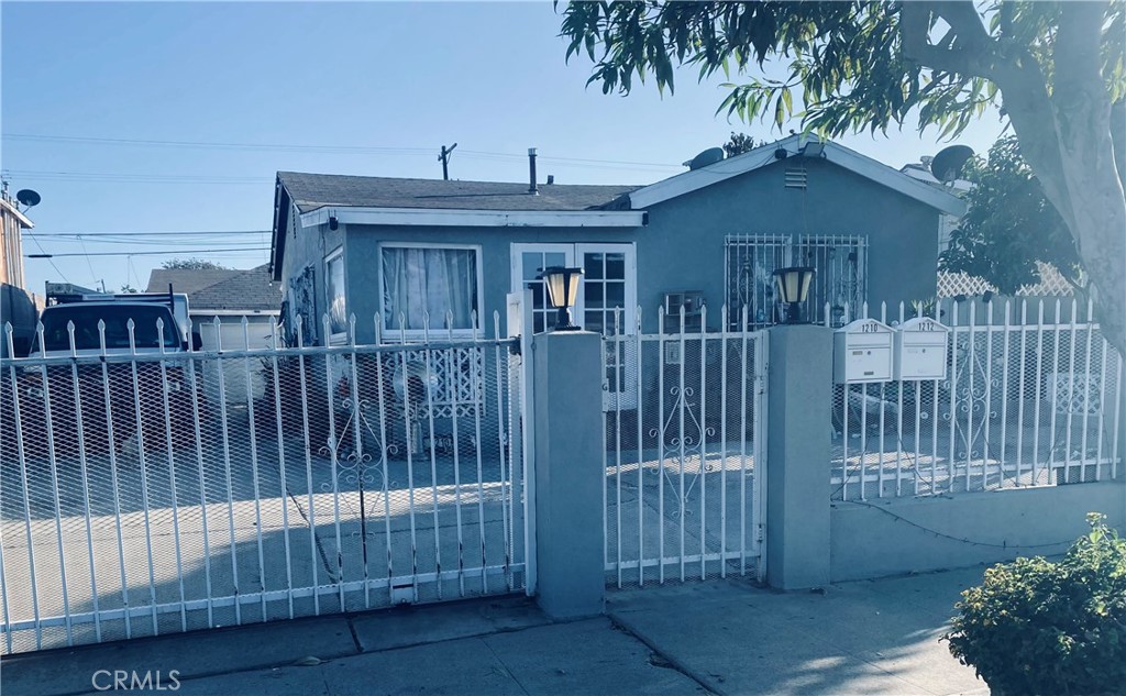 Discover the perfect blend of homeownership and investment with this duplex. The beautifully maintained 2 bedroom 1 bathroom duplex features laminate flooring and tile throughout. It features separate entrances ensuring privacy for both you and your tenant.