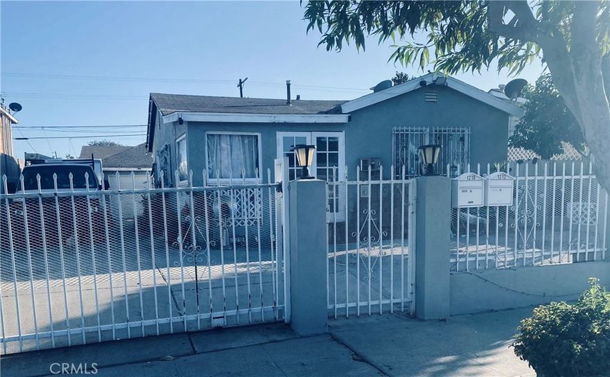 Discover the perfect blend of homeownership and investment with this duplex. The beautifully maintained 2 bedroom 1 bathroom duplex features laminate flooring and tile throughout. It features separate entrances ensuring privacy for both you and your tenant.