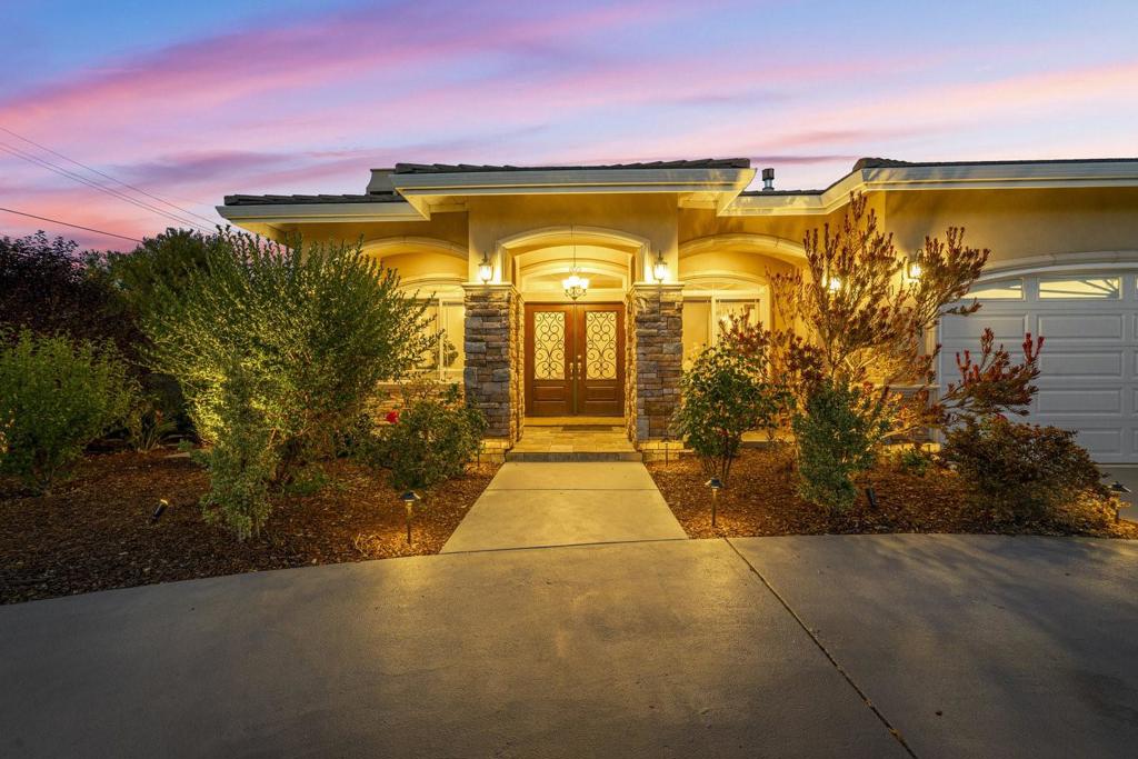 Move in and enjoy this gorgeous single-story home in Saratoga. Impeccably remodeled/built in 2015 designer touches throughout. Soaring 10 ft ceilings with 11 ft soffit. Crown moldings. Gleaming red-oak hardwood flooring & imported porcelain tile. Stunning open chef's kitchen with large breakfast bar island, granite countertops, stainless steel appliances, walk-in pantry & extended nook area. Gas fireplaces in living & family rooms. Tastefully appointed bathrooms. Oversized primary suite with three closets and access to private yard. Separate junior suite with attached bathroom & walk-in closet. Desirable open single-story layout. Separate third suite with kitchen, living area, bedroom, full bathroom and patio. Attached 2 car garage with epoxy floors. Concrete tile roof. Private backyard with large turf lawn, patio and fruit trees. Close proximity to schools, shopping, and dining.