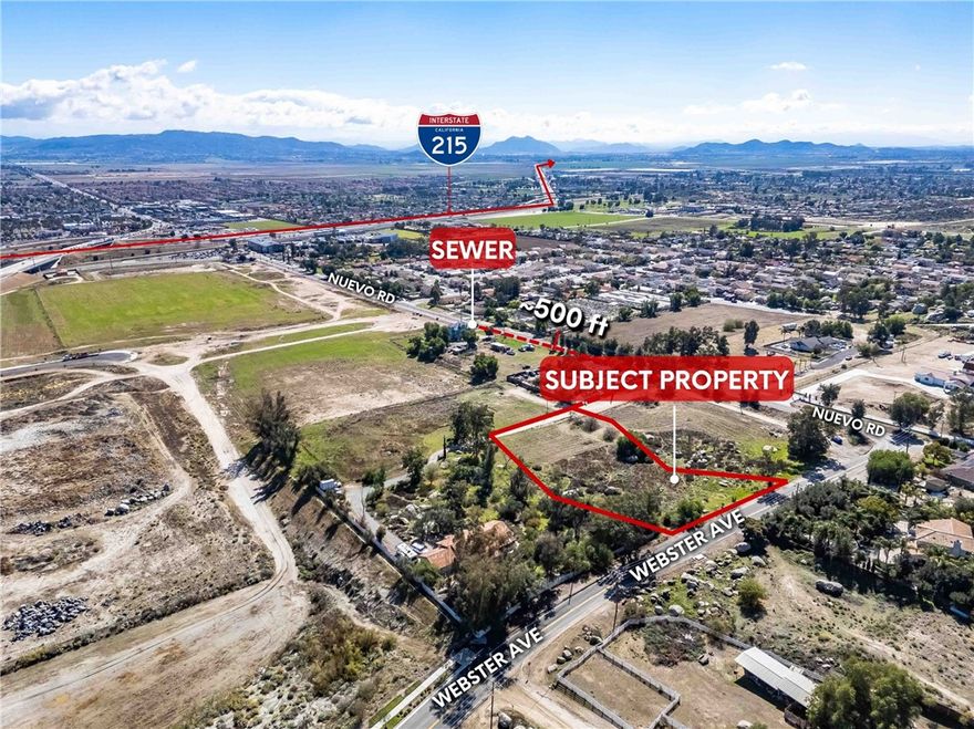 One of three contiguous parcels sold together or separately, this 1.63 acre parcel is the middle parcel on Webster Ave. north of Nuevo Rd. and in an OPPORTUNITY ZONE 1/2 mile from the I-215 interchange which ALLOWS 60 UNITS PER ACRE! WATCH aerial video! This is a timely opportunity for an investor or developer to acquire land with Mixed-Use Zoning, bordering Perris, close to the I-215/CA-74 Freeways and Nuevo Road interchange with NO Mello Roos taxes and is exempt from capital gains taxes if held over 10 years. With water and power next door and sewer in the street in front of the 2nd neighboring parcel, this property is ripe for development. We are just down the street from Perris Plaza with Walmart, ALDI, Stater Bros, In-N-Out, Chick-Fil-A, Ross, Starbucks, Planet Fitness and so many other neighborhood amenities that make this area perfect for future residents and future growth.  Permitted uses include residential, parks, restaurants, retail, medical offices, and professional services. With conditional approval, additional uses may include hotels, entertainment venues, convenience stores, mobile home parks, and more. Please see OM for a full list of permitted uses. The population of Perris across the street is increasing, income per capita is increasing, poverty is decreasing, and the number of employed persons is also increasing! The other two contiguous parcels that are being sold are 305-270-031 and 305-270-032. Riverside County is an incredible investment opportunity featuring proximity/access to three major interstates, the nation’s busiest port system, Ontario Airport, UPS & FedEx Ground Hubs and BNSF. The area around Nuevo Road and Webster Avenue in Riverside County/Perris, CA is rapidly developing with major commercial and industrial projects. Nearby, the Perris Gateway Distribution Facility is under construction on 42 acres near I-215, set for completion by August 2025, bringing 855,330 sq ft of warehouse space and 27,000 sq ft of retail including Taco Bell, Starbucks, Shell, and Sonic.  Infrastructure improvements are also underway, including an $8 million upgrade to Ramona Expressway and an expansion of the Perris–South Metrolink Station, adding a second platform and a 2.7-mile track upgrade. With these developments, the region continues to grow as a key logistics and business hub in Southern California. With the ideal zoning and location, this property is great for development or investment. Secure this Opportunity Zone land before it’s gone!