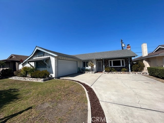 3 Bedroom 2 Bath home, Kitchen with Wall Oven, Cook Top, Dishwasher, Separate Dining, Tile Flooring, Ceiling Fan, Fireplace, Vertical Blinds, Laundry Hook-Ups, Large Covered Patio, Yard, Double Enclosed Garage With Opener, Near Park, School And Huntington Harbor.