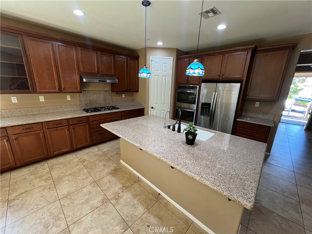 Single-story 4-bedroom, 2-bath home located in the Summerly community of Lake Elsinore. This home features an open floor plan with a great room concept that combines the kitchen, dining, and living areas. The kitchen offers ample cabinet and counter space, with a functional layout for everyday living.
The primary suite includes a private bath and walk-in closet. All bedrooms are well-sized and located on a single level. The property includes a good-sized backyard, suitable for outdoor activities or entertaining.
Located within a master-planned community offering access to amenities including a clubhouse, community pool, parks, and walking trails. The home is situated near the Summerly Golf Course and is close to shopping centers, restaurants, coffee shops, convenience stores, a movie theater, and freeway access.