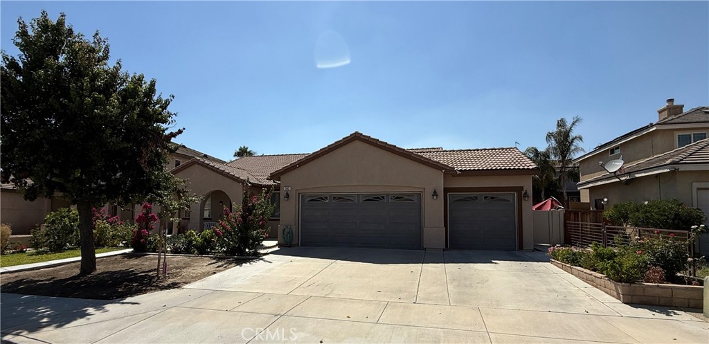 Welcome to this stunning, move-in ready home in San Jacinto, perfectly located within minutes from Schools, Shopping Centers, Eateries and Parks. This spacious property boasts a year-round comfort with over 10 different kind of fruit trees, featuring a covered patio perfect for relaxing or hosting guests. Inside, you'll find a versatile open floor plan oversized front Family Room, large chef’s kitchen, ample cabinetry, that flows into the cozy Dinning/family room with fireplace. the Property has 4 spacious bedrooms and 2 full bathrooms, along with a laundry room for added convenience. 3 car Garage and a spacious driveway. Brand new A/C unit, Porcelain Tile Flooring, and Ceiling Fans throughout, perfect for any size family in a quiet friendly neighborhood. this property is a must see