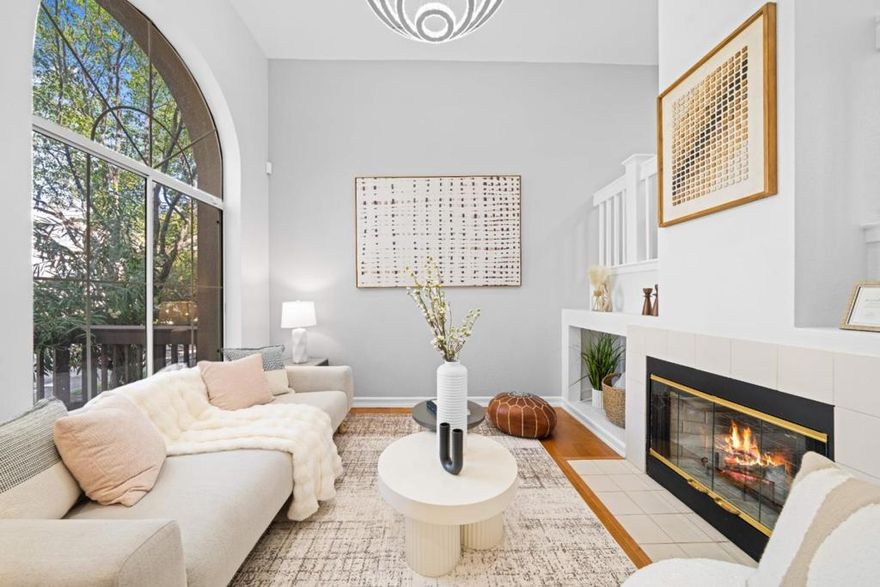 An updated townhome in the Cherry Guardino neighborhood of Fremont. Zoned for the Washington High School, this home is just minutes away from Lake Elizabeth, the Fremont Main Library, major hospitals, and shopping & dining options, and has easy access to the BART station & Hwy 880. Outside, this house features an arched window, an inviting front patio, and a 2024 new roof. Inside, it has soaring ceilings, newly installed recessed lighting, and hardwood floors. The formal dining area opens to the kitchen which is equipped with a French-door refrigerator, gas range & oven, hood, dishwasher, granite countertop & customized dark wooden cabinets. Upstairs, the spacious primary suite offers a vaulted ceiling, two generous closets, and an en-suite bath with a double vanity, tile-surround shower and tub, and a shower niche. A hallway dry bar adds a stylish touch for entertaining. The additional bedrooms are bright and well-sized, each with its own closet. The updated hallway bath features a sliding glass shower door and modern finishes. All bathrooms were fully remodeled, including the half bath on the main level. Additional highlights include a dedicated laundry area and an attached two-car side-by-side garage.