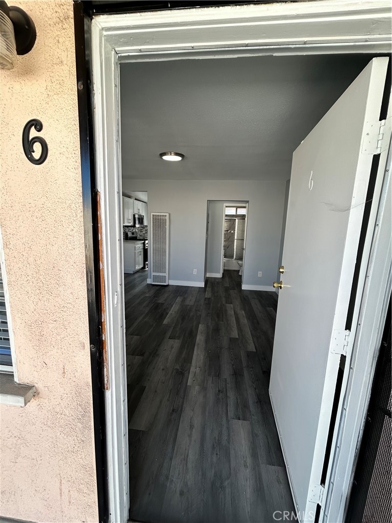 Our office is proud to present this beautiful and well maintained studio home for lease. This upstairs unit has been remodeled and has a stainless steel stove, microwave, and refrigerator. Laminate flooring is present throughout the unit. There is one off street parking space.