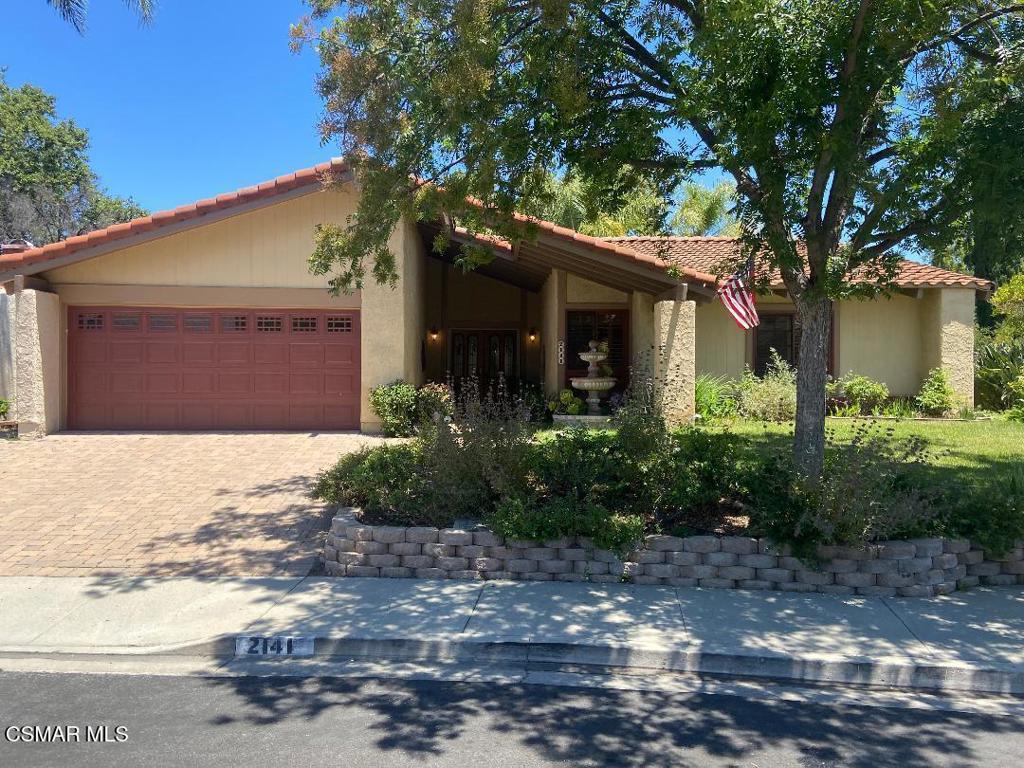 Stunning single story pool home on a quiet Cul De Sac in highly desirable Westlake Village. This 3 bedroom 2 bath home features bamboo, oak, slate and tile flooring throughout. Cathedral ceilings help make it light and bright. The gourmet kitchen includes granite counters & stainless steel appliances. The private master suite is inviting & features a wall of custom closets and lovely granite double vanity. The combination living & dining enjoys pool and tree-top views as well as a dual sided fireplace shared with the family room. There are 2 lovely ceiling fans in the family room with an additional 2 in the master & kitchen nook. Large laundry room with included front load washer & dryer (without warranty or repairs). 2 car finished garage with additional storage.