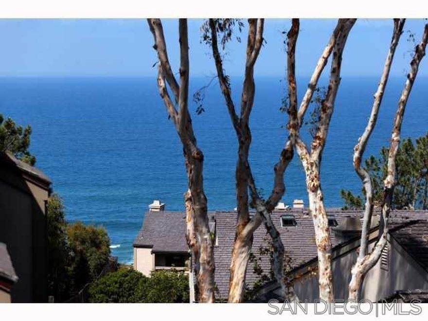 MINIMUM 6 MONTH LEASE - Upgraded, FULLY FURNISHED (can be unfurnished for $5,000/mo with a year lease), Del Mar Woods condo open floor plan separate kitchen, dining and living room areas. Enjoy ocean views from oversized patio. Stainless appliances, granite counters, custom cabinetry, laminate flooring and upscale furnishings. Master suite features balcony, bathroom with dual closets, dual sinks & a designer tile shower. Guest room features twin trundle beds and flat screen TV. Complex amenities include cliff side pathway to the Village or beach, tennis courts/pickleball, under ground parking and add'l outside parking space.