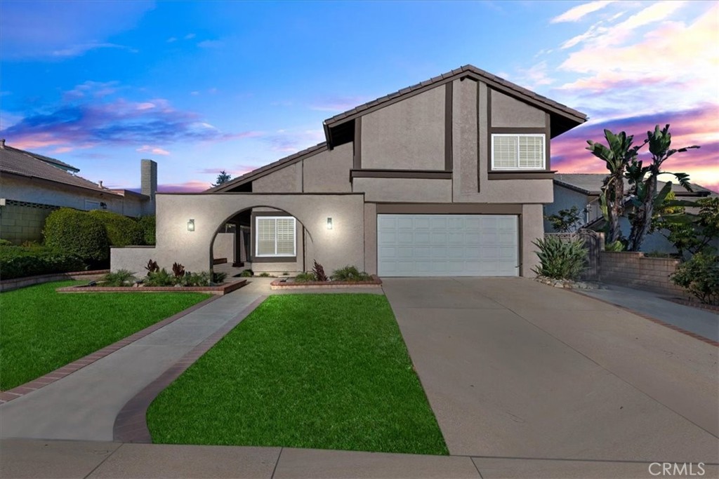 **Come see this beautifully remodeled two-story home in desirable North Upland**—perfect for a growing family and ready for immediate move-in. The first floor features a spacious living room with vaulted ceilings, a large picture window, and a cozy fireplace. You'll also find a formal dining room, a remodeled kitchen that opens to the breakfast nook and family room—complete with its own fireplace. There's also a large den/office that could serve as a fifth bedroom and a convenient half bath on the main level. Upstairs offers a spacious primary suite with a remodeled en suite bath, three additional large bedrooms, and a full hall bath.
Upgrades include a custom front door, new luxury vinyl plank flooring, dual pane windows, plantation shutters, ceiling fans, and more. This home is close to award-winning schools, the Claremont Colleges, Ontario International Airport, and the 210 freeway. **Homes like this don’t last—schedule your showing today before it's gone!**