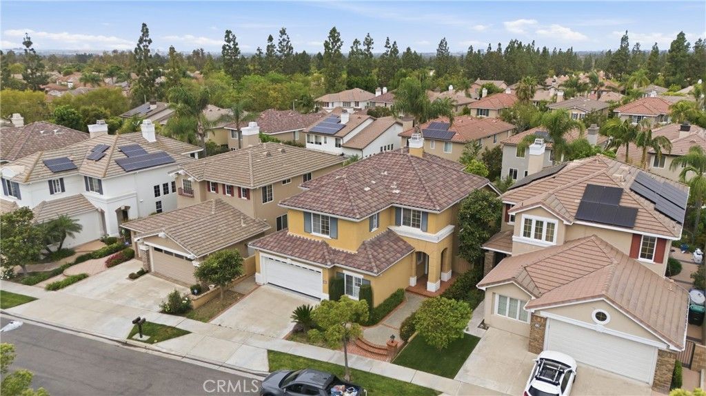 Photo of 21 WEDGEWOOD, Irvine, CA 92620 (MLS # OC26067251)