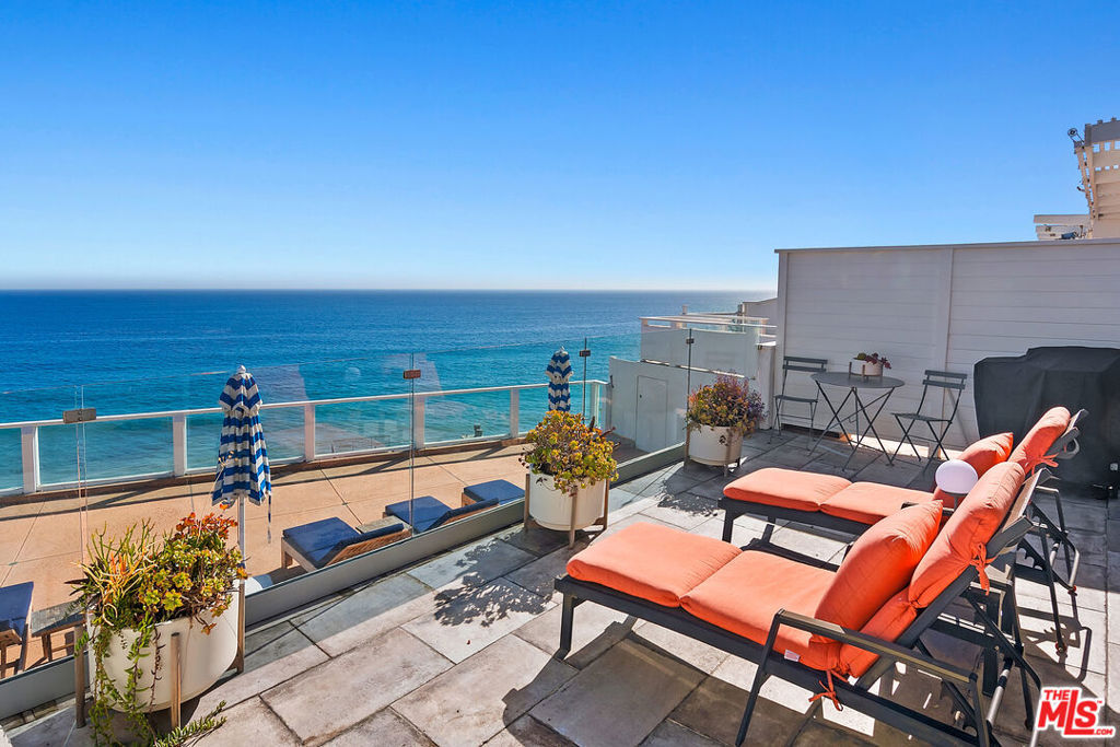ONE-OF-A-KIND! Enjoy the solitude Malibu has to offer. Unobstructed ocean views as far as the eye can see. Fully furnished and tastefully remodeled ocean front condo in Malibu's private gated hidden gem. Live in one of most iconic architectural properties, located on a prized celebrity Escondido beach, The Holiday House above Paradise Cove. This historical Richard Neutra designed property has been remodeled to create the perfect resort style lifestyle. This is one of only 4 (four) ocean front row view poolside units. The Book " Dream Palaces of Hollywood's Golden Age" states that one of the front row units was where JFK and Marilyn Monroe used to rendezvous. Relax on a private spacious sun deck with breathtaking ocean views. Private gated next to Geoffrey's Restaurant. Assigned 2 tandem parking. Keys to the Beach Stairs. Available Short or Long Term Lease.