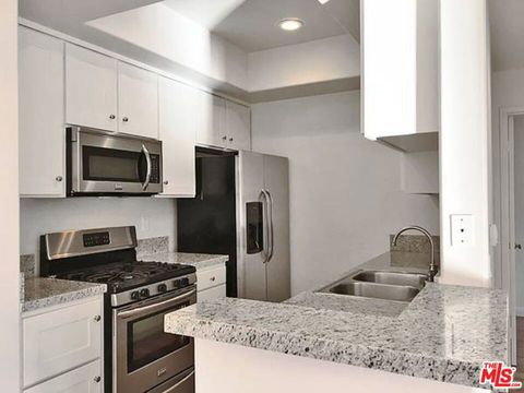 Photo of 14430 BENEFIT Street #201, Sherman Oaks, CA 91423 (MLS # 26643323)