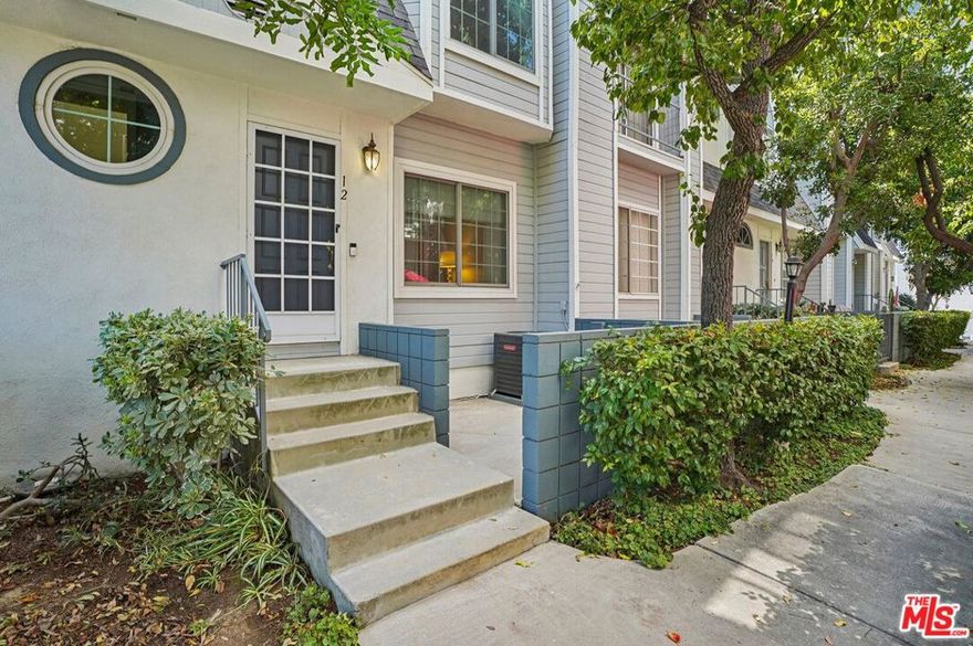 Exceptionally remodeled townhome in the Belmont Townhomes complex. Perfect location with guest parking nearby and easy access to the pool/spa area. Thoughtfully redone with new luxury vinyl flooring and paint. This home is ready for its new owner and new memories to create. Two primary suites upstairs featuring ensuite baths make for easy living. A huge 2-car garage with direct access and your own laundry area downstairs. This complex offers a sparkling pool and a comfortable spa in a gated community. Come see, come buy!