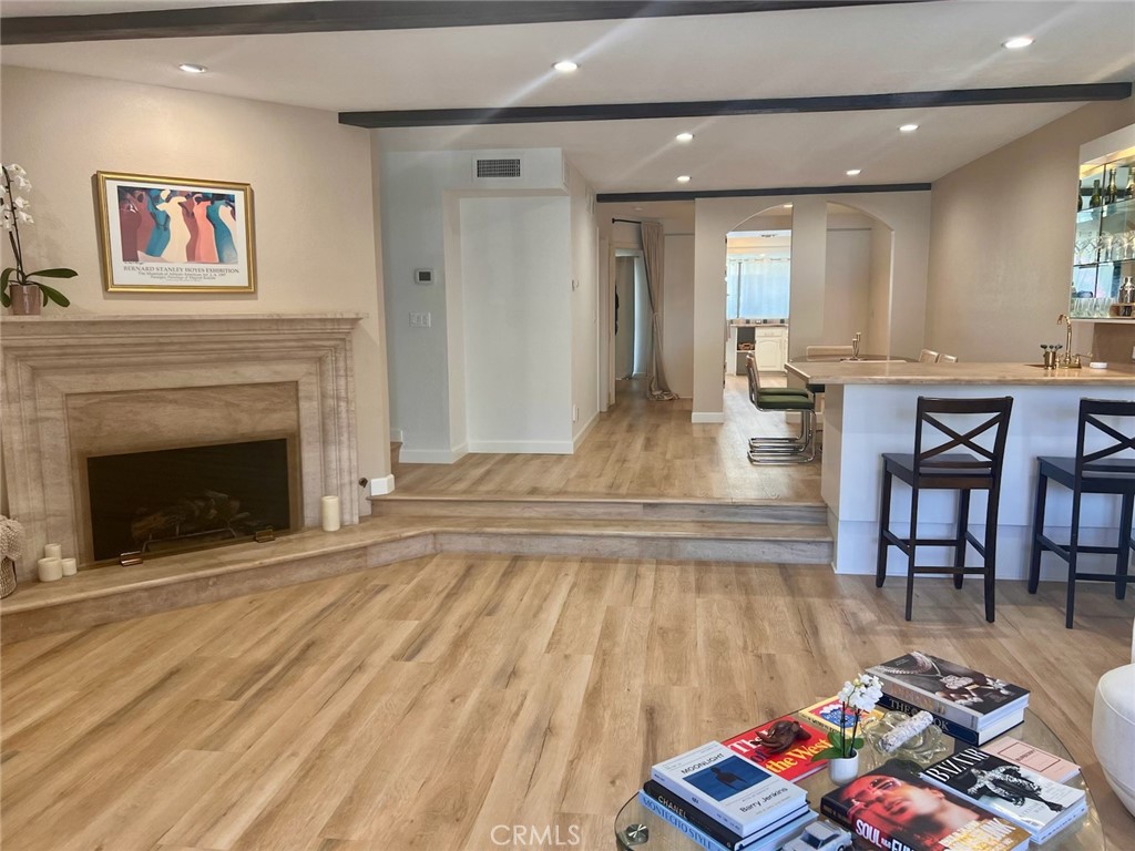 Welcome to this newly renovated town-home in the heart of Encino. This 3 bedroom 4 bath townhouse has over 2,800 sq.ft. The spacious living room features a fireplace and bar. The dining room is open to the living room and is perfect for entertaining. The kitchen has granite countertops and a cozy breakfast nook. The first floor bedroom can easily be used as a den or office. Upstairs features a large loft with cathedral ceilings. The primary suite has a large bathroom and both a walk-in closet and slider closet. The large secondary bedroom is also off the loft area. On the bottom level is a very large bonus room with a large closet. There is also a full bathroom on the bottom level making the room suitable for movies, games or even an extra large bedroom. The laundry area is also on the bottom level. The location of this home is superb - close to restaurants, freeways and transportation.