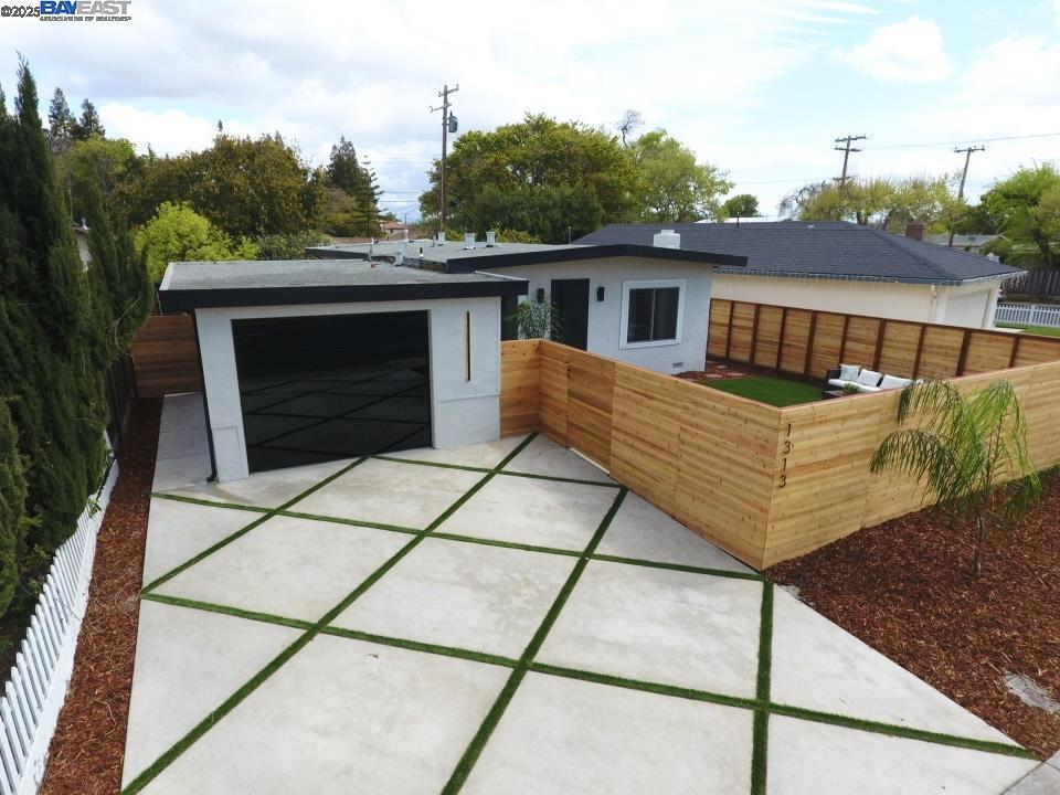 Welcome To This Beautifully Renovated 3-Bedroom, 2-Bathroom Home In The Heart of Santa Clara. Offering Modern Living At Its Finest, This Home Boasts 1,050 Sqft Of Open-Concept Living. Featuring A Beautifully Upgraded Kitchen With Custom European Cabinetry, Quartz Countertops, And Brand-New Appliances. Both Bathrooms Have Been Thoughtfully Remodeled, Cladded In Stone And Tile Finishes. Engineered Hardwood Flooring Runs Throughout The Home Giving The Durability Of Hardwood Alongside A Scratch And Water Resistant Finish. Notable Design Elements Include A Heavy-Duty Front Door And A Striking Custom All-Glass Garage Door, Adding To The Home’s Curb Appeal. The Spacious, Low-Maintenance Front And Backyard Are Fully Fenced For Enhanced Privacy And Provide Excellent Space For Outdoor Activities. This Home Is Conveniently Located Near Central Park Featuring The Magical Bridge Playground, Pickleball, Tennis, And Ample Recreational Spaces. Just Minutes From Major Commute Routes And Tech Giants Like Nvidia And Apple. Perfectly Blending Style, Comfort, And Functionality, This Home Is An Ideal Sanctuary For Those Seeking A Move-In-Ready Property With Contemporary Upgrades In A Premier Silicon Valley Location. 3D TOUR AVAILABLE: https://my.matterport.com/show/?m=1DKLZpmhXgR&brand=0&mls=1&