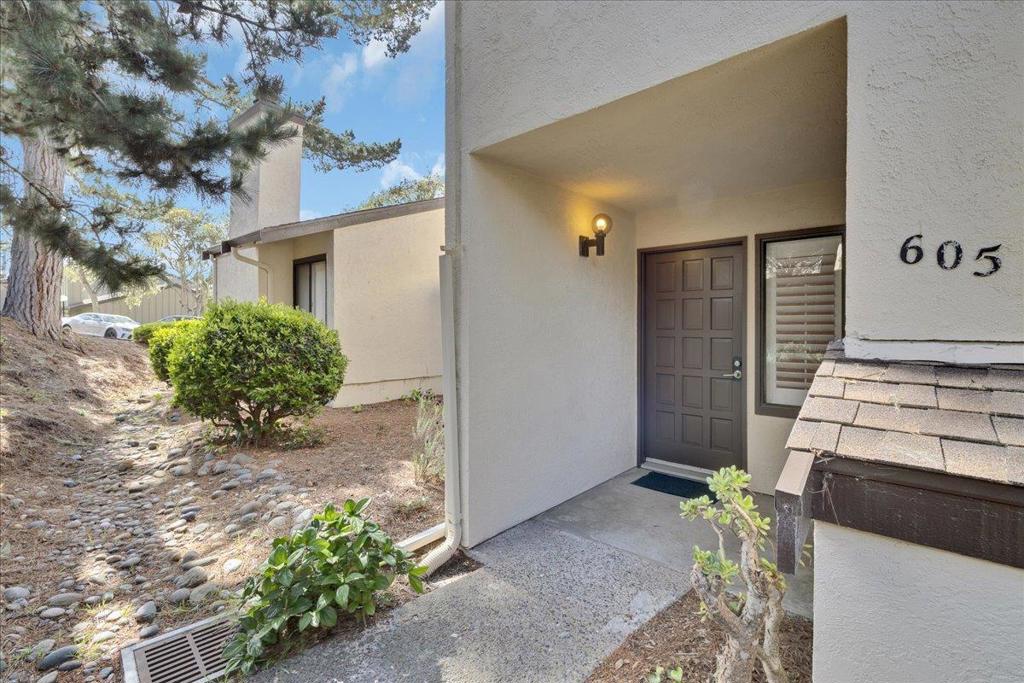 If location and "Move in Ready" are two items on what your next home needs to consist of, then this beautifully appointed 3-bedroom, 2.5-bath residence offers the perfect blend of comfort and convenience. As you step inside, you'll immediately appreciate the brand new flooring that flows throughout the entire home, complemented by fresh paint and stylish baseboards that create a warm and inviting atmosphere. The main level features a convenient half bath for guests, while the upper level boasts two full baths, ensuring ample space for your family and visitors. There is also room for a chair lift or elevator when the time comes. New flooring, fresh paint, and an updated stove and range were just brought in, giving the kitchen an updated feel, while allowing you a blank canvass for your personal touches. Step outside to your private concrete patio, perfect for morning coffee or evening gatherings. The detached 2-car garage provides not only parking but extra storage space for all your needs. Located centrally in Pacific Grove, this home is walking distance to top-rated schools, shopping, and a variety of restaurants. Don't miss out on this incredible opportunity to own a piece of Pacific Grove paradise!