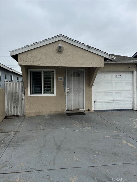 Photo of 418 W Spruce Street, Compton, CA 90220 (MLS # PW25123373)