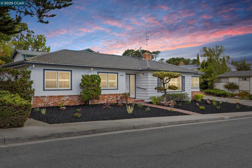 Lovingly maintained 3-bed, 2-bath home on a spacious 6,500 sq ft corner lot in May Valley! This 1,732 sq ft gem features new vinyl flooring, brand-new bedroom carpets, fresh interior/exterior paint, dual-paned windows, beautiful shutters, and A/C. Enjoy a large 2-car garage with dual doors—perfect for car enthusiasts. The front and backyards are newly landscaped and ready for relaxing or entertaining. Located just minutes from Sheldon Elementary, De Anza High, San Pablo Reservoir, and the coveted Lakeridge Athletic Club with pool, gym, and tennis. Easy commute to Orinda and Berkeley!