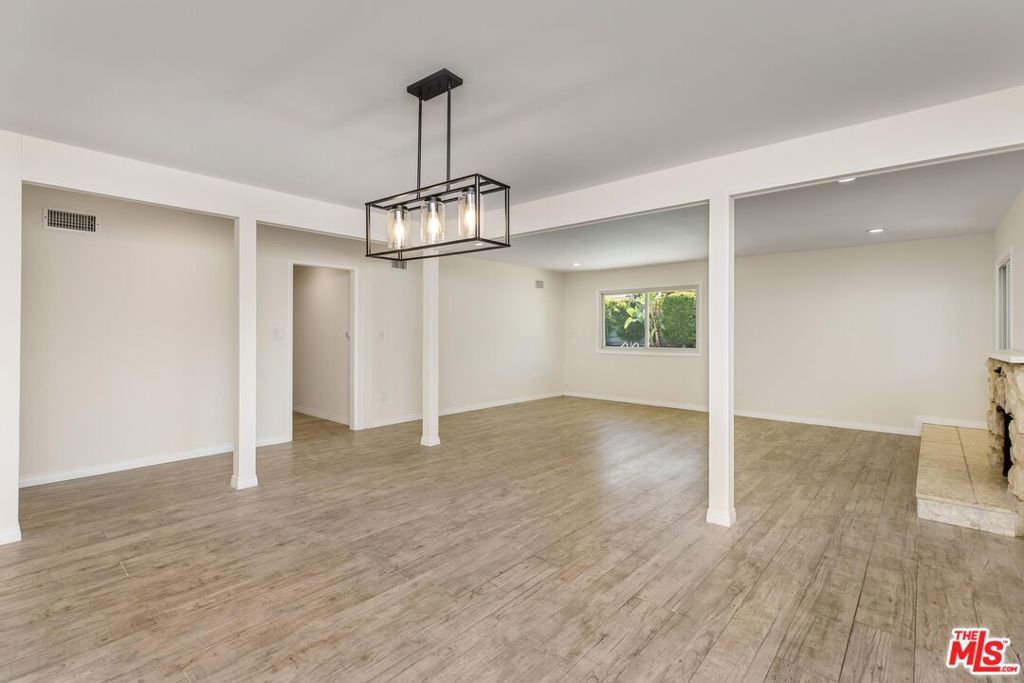Photo of 9511 Mclennan Avenue, Northridge, CA 91343 (MLS # 25602969)