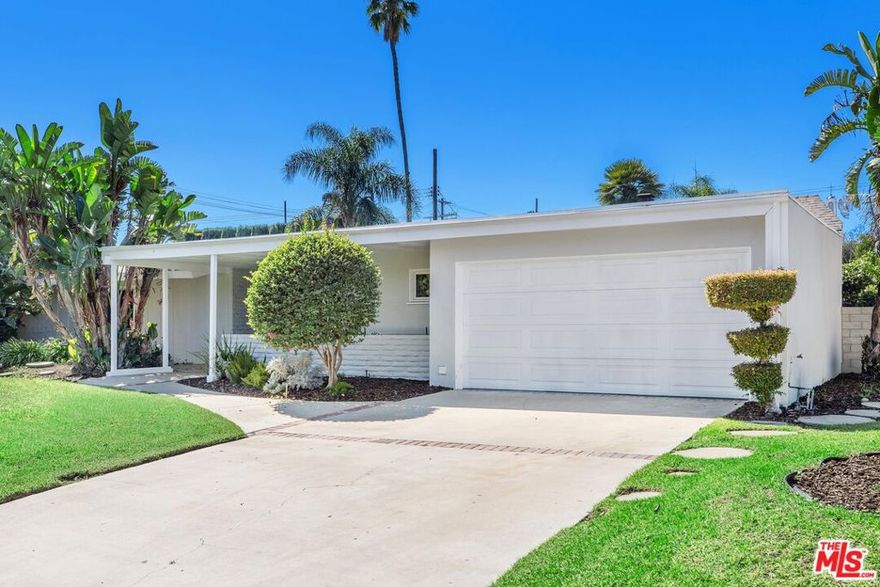 Nestled on a peaceful cul-de-sac in a desirable Northridge neighborhood, this inviting single-story pool home offers 3 bedrooms and 2 bathrooms. A welcoming front porch leads into a bright and spacious floor plan. The remodeled kitchen boasts quartz countertops, white cabinetry, a breakfast bar, newer appliances and seamlessly opens to a large dining area with a stylish chandelier. The living room offers a cozy fireplace and sliding glass doors that open to the backyard and pool area. The primary bedroom includes a walk-in closet, direct access to the backyard and en suite bath. Two additional bedrooms are generous in size and share a full hallway bathroom with a vanity and shower-over-tub. Step outside to your private backyard oasis featuring a covered patio, grassy play area, mature landscaping, and a sparkling pool, ideal for summer gatherings and entertaining. The home also has a value-enhancing, and money-saving solar energy system. Conveniently located near top-rated schools, shopping, dining, and the 405 and 118 freeways, this wonderful home is the perfect place to create lasting memories.